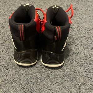 Jordan Red and Black Sneakers with Iconic Design